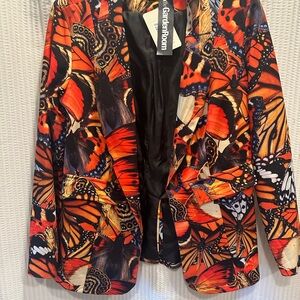 Vibrant Orange and Black Blazer with Artistic Wing Pattern